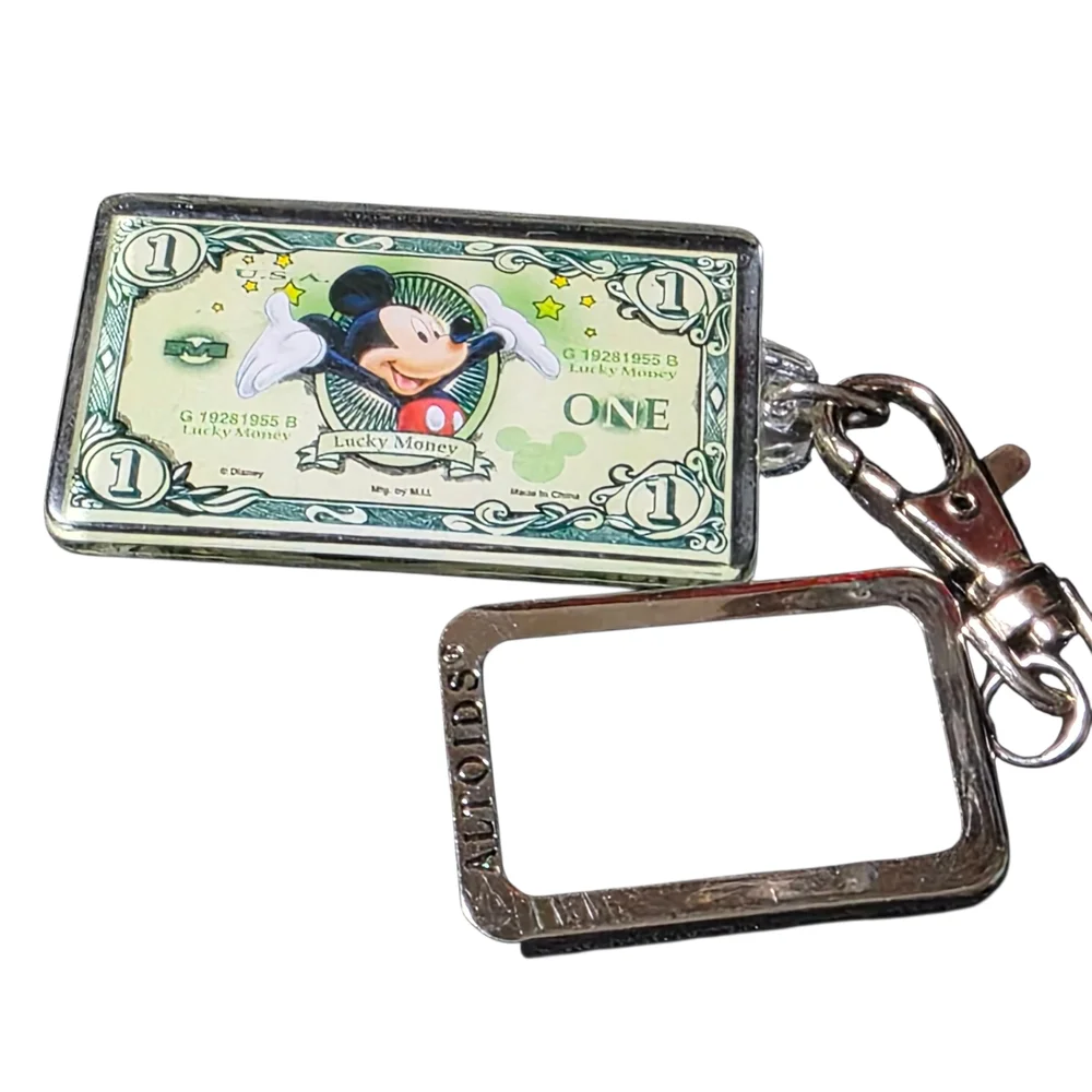 Silver Keychain with Cartoon Design